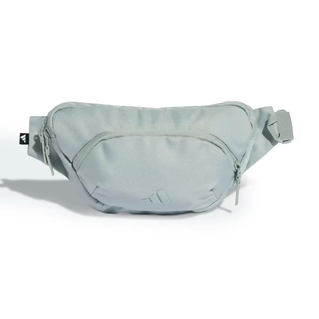 Pochete Adidas Prime verde claro Wonder Sage em poliéster, vista frontal com alça ajustável e bolso com zíper